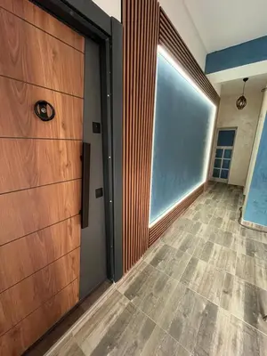 an empty room with a door and a tile floor at BoxRoom1 in Kyustendil