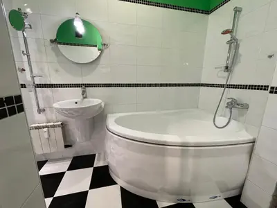 a bathroom with a toilet and a sink at Art city studio in Sofia center in Sofia