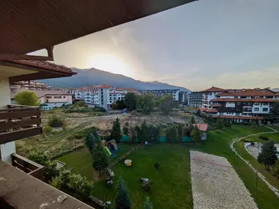 a view of a park in a city with buildings at Modern 1 Bedroom by the Gondola in Bansko