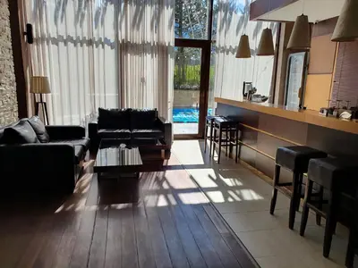 a living room with a couch and a table at AZAX Apartments in Terra Complex in Bansko