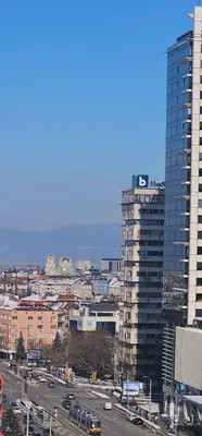 a view of a city with a tall building at Home away from home in Sofia