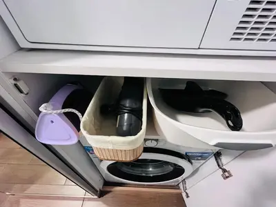 a drawer in a cabinet with a hair dryer at Prima apartment in Sofia