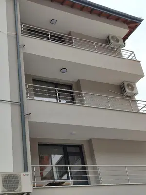 an external view of a building with balconies at MariGold Apartments in Sandanski