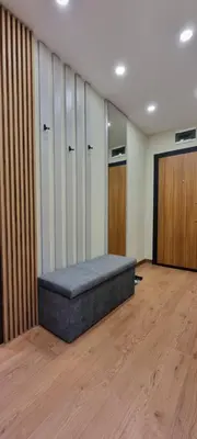 a room with a bed in a room with lockers at MariGold Apartments in Sandanski