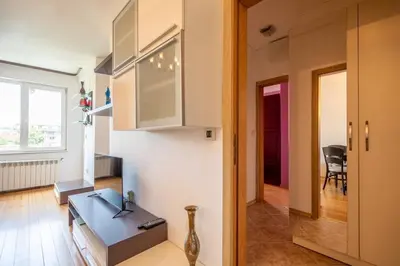 a kitchen with a table in a room at Central Sofia Retreat in Sofia