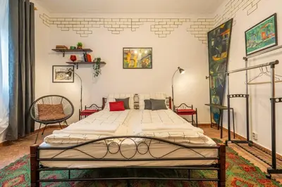 a bedroom with a large bed in a room at Belle Epoque-Sofia-Free parking in Sofia