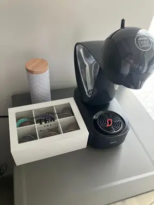 a coffee maker sitting on top of a table at Ira 28 in Sandanski