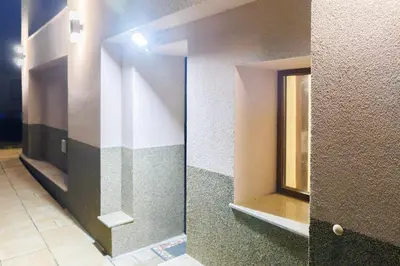 a bathroom with a mirror and a window on the wall at Mountain studio Govedartsi in Govedartsi