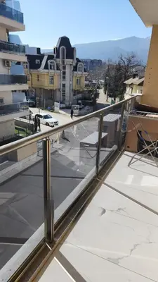 a balcony with a view of a city at Zen Lodge, with private parking next to Paradise in Sofia
