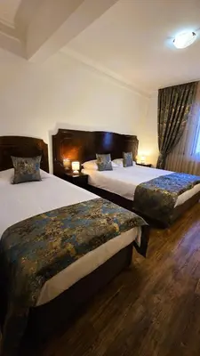 a hotel room with two beds in a room at Vintage H&R St Anna in Sofia