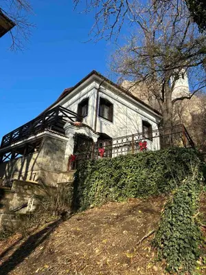a house sitting on top of a hill at Lambrina 2 Apartment in Plovdiv