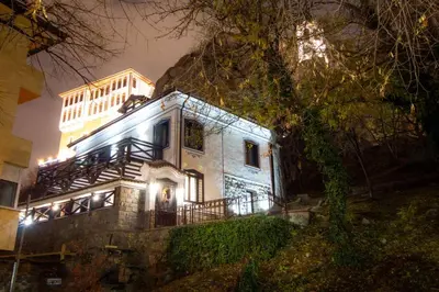 a house is lit up at night at Lambrina 2 Apartment in Plovdiv
