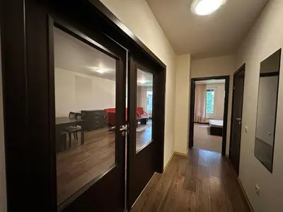 an open door to a room with a dining room at Bansko Royal Towers in Bansko
