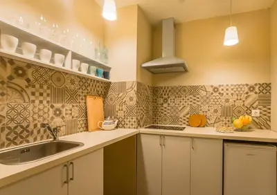 a kitchen with a sink and a counter top at THE GOOD PLACE - historical center, unique in Sofia