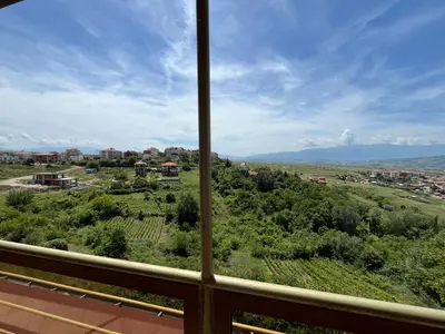 a view from a balcony of a town and mountains at BELLA VISTA Holiday Home 24h check in in Sandanski