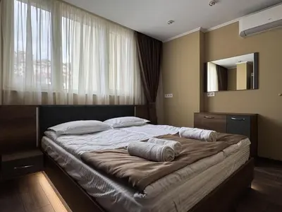 a bedroom with a bed with two pillows on it at ApartmentSpiceDevin in Devin