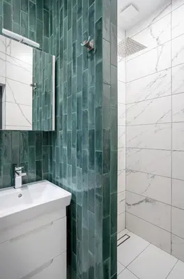 a bathroom with a sink and a shower at Landmark Luxe 2BR Apt with Parking in Sofia