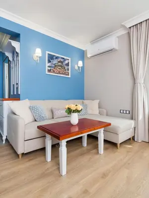 a living room with a couch and a table at Casa Dolce far niente , in Blue, PARKING in Sofia