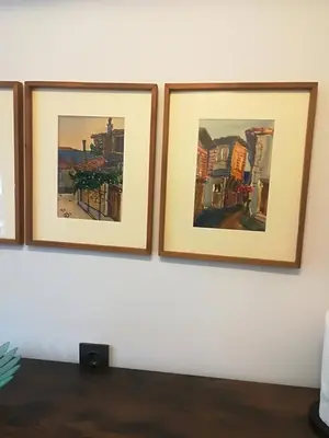 three framed pictures hanging on a wall at Urban Comfort - Central 1BDR near Vitoshka & NDK by Flat Mаnager in Sofia