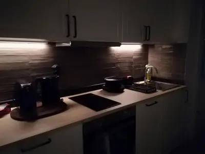 a kitchen with a sink and a counter top at Urban Comfort - Central 1BDR near Vitoshka & NDK by Flat Mаnager in Sofia