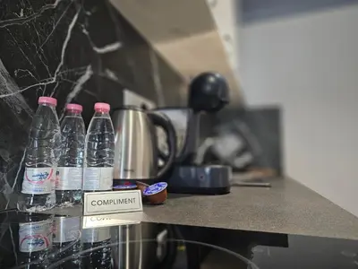 a group of bottles of water sitting on a counter at Continental studios 2 in Sofia