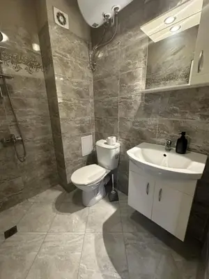 a bathroom with a toilet and a sink at Good Morning in Sofia