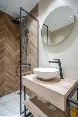 a bathroom with a sink and a mirror at Elegant & Stylish 2-Bedroom Apartment in Sofia