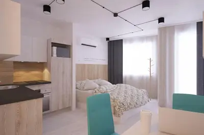 a room with a kitchen with a bed in it at Natan Royal in Sofia