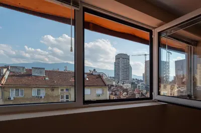 a view of a city from a window at Studio KFC in Sofia