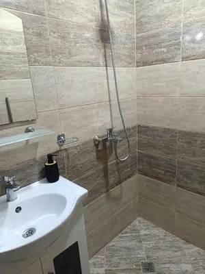 a bathroom with a sink and a shower at One-Bedroom Apartment-14 Filip Makedonski 49B in Plovdiv