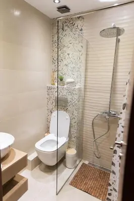 a bathroom with a toilet and a shower at Artistic and cozy apartment in the center of Sofia in Sofia