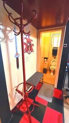 a small bathroom with a room with a toilet at Sofia's Gem Apartment - Prime Location in Sofia