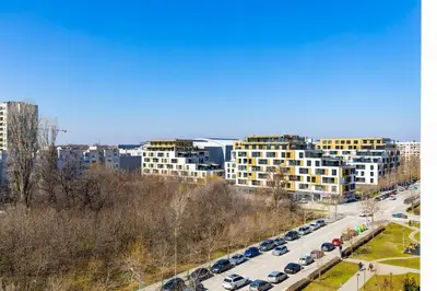 a city with cars parked on a road with buildings at City Park flat near to Medical University in Plovdiv