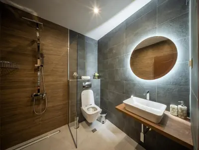 a bathroom with a toilet and a sink and a shower at Top Centre Spacious 2 bedroom Apartment in Sofia