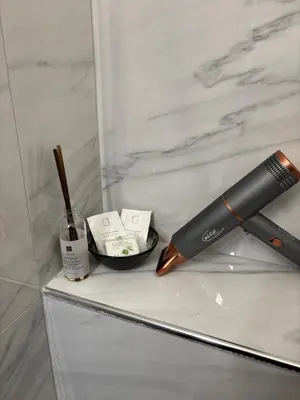 a pen sitting on top of a white marble counter at Kolev Apartment 2 in Sofia
