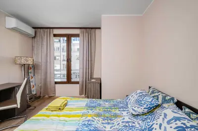 a bedroom with a bed and a window at 1BD Apartment in Sofia City Center by Flat Mаnаger in Sofia