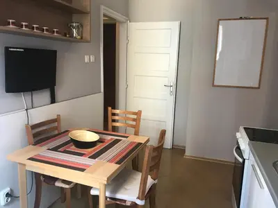 a kitchen with a table with a bowl on it at Beautiful Business Apartment - Ivan Denkoglu Street by Flat Mаnager in Sofia