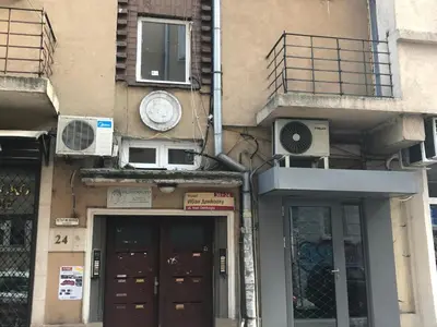 a building with two air conditioners on the side of it at Beautiful Business Apartment - Ivan Denkoglu Street by Flat Mаnager in Sofia
