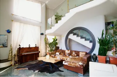a living room with a couch and a table at Къща за гости,, Зафир,, in Sofia