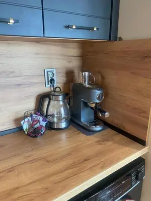 a kitchen counter with a coffee maker and a mixer at Djanina 3 in Sandanski