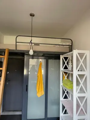 a room with a bunk bed and a closet at Nice and cozy in Sofia