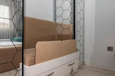 a stack of boxes in a room with a mirror at ElenartLux - Baby Cot - Pets Allowed - Free Parking & Fast Wi-Fi in Plovdiv