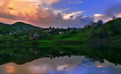 a view of a lake at sunset with the sky at Комплекс Арда in Arda