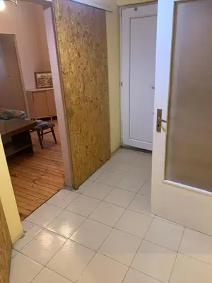 a room with a door and a tile floor at West Park Retreat in Sofia