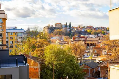 a view of a city with buildings and trees at Plovdiv Urban Gem 2BD Apartment by Flat Mаnаger in Plovdiv