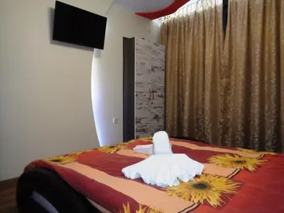 a bedroom with a bed with flowers on it at 