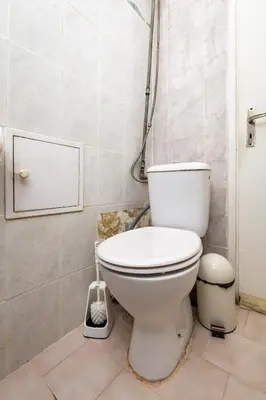 a bathroom with a white toilet in a room at 1-Bedroom Flat with Balcony in Plovdiv by Flat Mаnager in Plovdiv