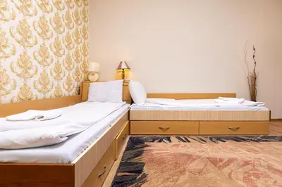 two beds sitting next to each other in a room at 1-Bedroom Flat with Balcony in Plovdiv by Flat Mаnager in Plovdiv