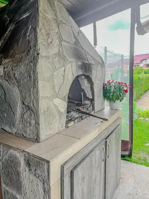 a stone pizza oven sitting on top of a counter at Tarein Studio in Bansko