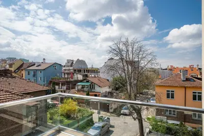 a view of a city from a balcony at Bright and Cozy 1BD Apartment plus Desk by Flat Mаnаger in Sofia